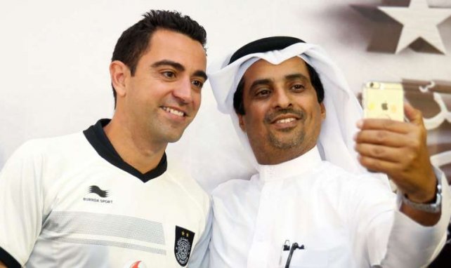 Gefeierter Held in Katar: Xavi (l.)