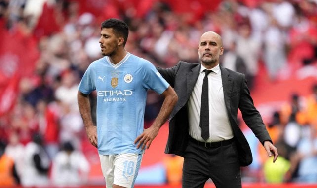 Pep Guardiola und Rodri von Manchester City nach einer Niederlage