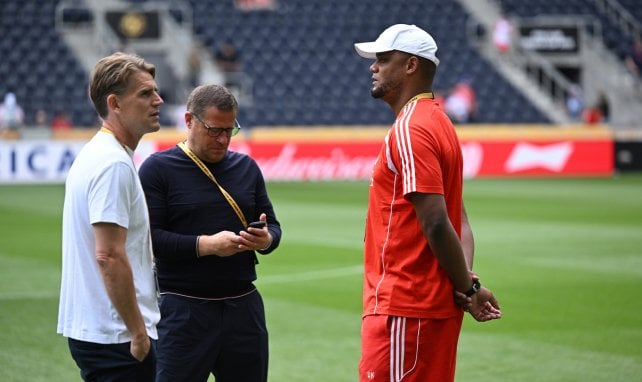 Vincent Kompany mit Max Eberl und Christoph Freund